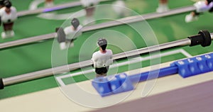 4K Â People play table football.